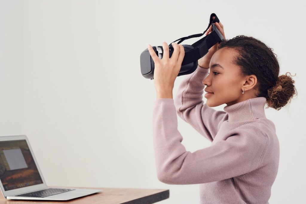 Girl putting on a VR headset