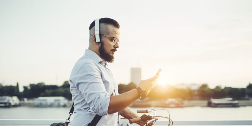 Man listening to his phone - Upstart Personal Loans