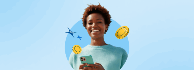 A woman holding a phone smiling