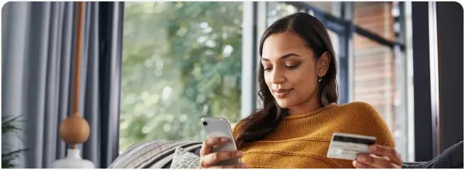 Female checking her rate for an Upstart credit card consolidation loan